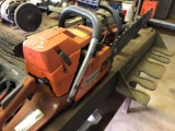 HUSQVARNA 372 XP CHAINSAW AND HOMELITE CHAINSAW WITH NUMEROUS EXTRA BLADES