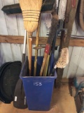 BIN OF NUMEROUS HAND TOOLS, BROOMS AND RAKES