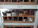 SHELF OF MISC. NUTS AND BOLTS