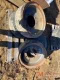 4 SOLID SKID STEER TIRES AND WHEELS