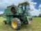 JOHN DEERE 4420 COMBINE, 2WD, ENCLOSED CAB, DIESEL POWERED ENGINE, 1404 HOURS, HYDRAULIC UNLOADING