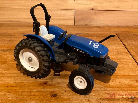 TN75 TRACTOR (AGES 8+)( ROLL BAR IS BROKEN)