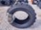 (1) NEW 10-16.5 SKID STEER TIRE