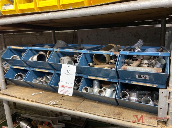 SHELF OF PIPE FITTINGS, METAL CONTAINERS