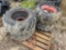 (4) SKID STEER TIRES AND WHEELS