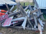 PALLET OF WOODEN SIGN STANDS