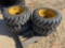 (4) NEW 10-16.5 SKID STEER TIRES AND WHEELS