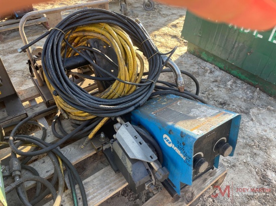 MILLER WIRE FEEDER WITH GUN AND HOSES