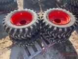 (4) NEW 10-16.5 SKID STEER TIRES AND WHEELS