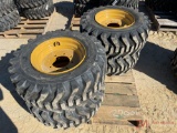 (4) NEW 12-16.5 SKID STEER TIRES AND WHEELS