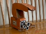 KODAK BROWNIE TURRET F/1.9 8MM MOVIE CAMERA WITH THREE LENSES ON A ROTATING TURRET WITH LEATHER CASE