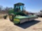 2003 JOHN DEERE 4990 SELF PROPELLED WINDROWER