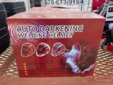 (1) NEW AUTO DARKENING WELDING HELMETS