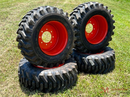 (4) NEW SKID STEER TIRES AND WHEELS