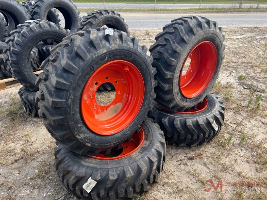 (4) NEW SKID STEER TIRES AND WHEELS