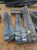 (1) NEW RUBBER TRACK, 300X52.5X84, (4) VARIOUS SIZE USED RUBBER TRACKS (5) TOTAL