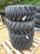 (4) NEW TIRES ON BOBCAT WHEELS