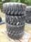 (4) NEW SKID STEER TIRES