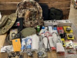 LARGE GROUP OF MISC GUN ACCESSORIES, BACKPACK, BINO CASES, HATS, LOCKS, ETC....