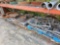 CONTENTS OF THREE SHELVES, MANHOLE LIDS/COVERS, PLASTIC PIPING, VARIOUS TIRES, METAL PIPE, AND METAL