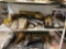 SHELF OF VARIOUS BUCKET TEETH AND SHANKS
