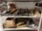 SHELF OF VARIOUS BUCKET TEETH AND SHANKS
