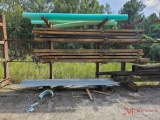 CONTENTS OF RACKS ROOF TIN, PVC PIPE, VARIOUS ROUGH CUT TIMBERS