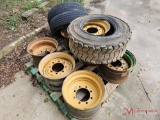 (7) STEEL WHEELS, (1) SKID STEER TIRE, (2) 235/80 R17 TIRES