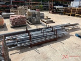 METAL RACK OF METAL FENCE POSTS AND TOP RAIL