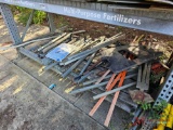 CONTENTS OF THREE SHELVES, MULTIPLE VARIOUS CONSTRUCTION SIGNS AND STANDS