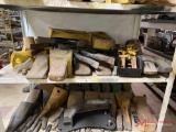SHELF OF VARIOUS BUCKET TEETH AND SHANKS