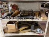 SHELF OF VARIOUS BUCKET TEETH AND SHANKS