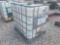275 GALLON PLASTIC TOTE WITH METAL CAGE