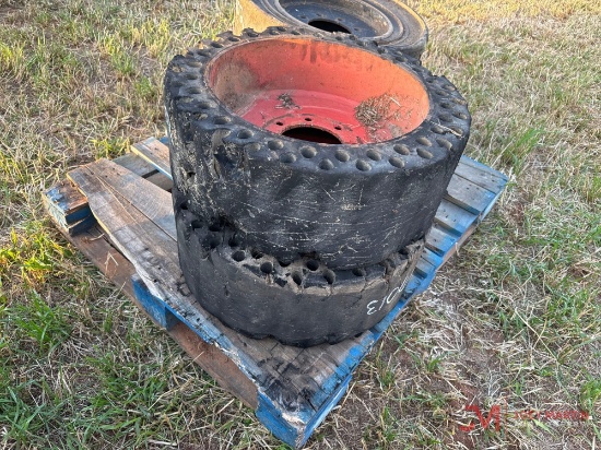 PALLET OF SOLID SKID STEER TIRES & WHEELS