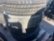 PALLET OF (4) VARIOUS TIRES & (3) STEEL WHEELS & (1) ALUMINUM WHEEL