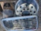 CONTENTS OF PALLET: TRUCK WHEEL SIMULATORS, HUB CAPS, & FREIGHTLINER GRILL