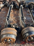 (2) FRONT TRUCK AXLES
