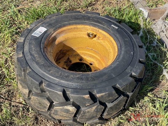 Unused Skid Steer 12-16.5 Tire & Wheel