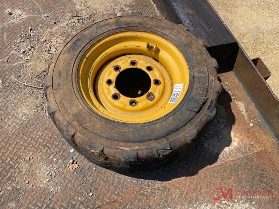 FOAM FILLED SKID STEER TIRE AND WHEEL