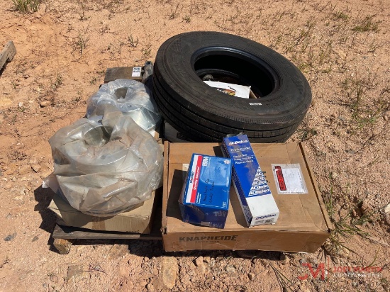 CONTENTS OF PALLET MISC BRAKE DRUMS, AUTO PARTS, 235/80R16 TIRE
