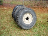 4- 37 12.5 16.5 TIRES AND 8 LUG RIMS