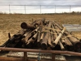 TRAILER LOAD OF WOOD POST,