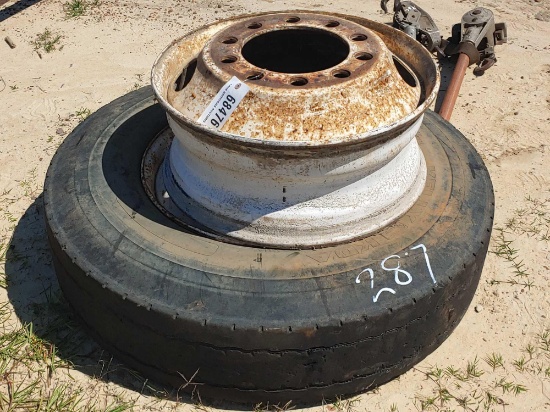 TRUCK TIRE AND 2 RIMS