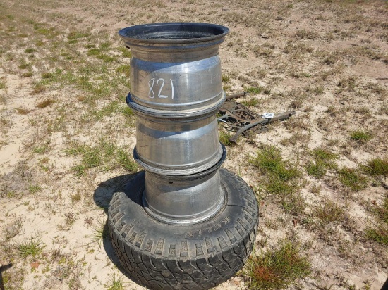 TIRE AND 4 CHEVY RIMS
