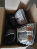 BOX CONSISTING OF HEADLIGHTS AND AIR CLEANER PARTS