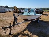 729 - 14' MCKEE BOAT AND TRAILER