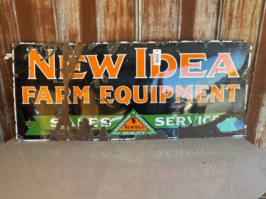 "NEW IDEA FARM EQUIPMENT" SIGN