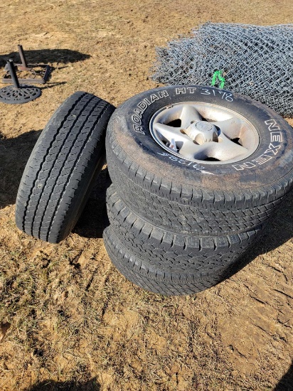 4 - 265/75 R16 TIRES & RIMS