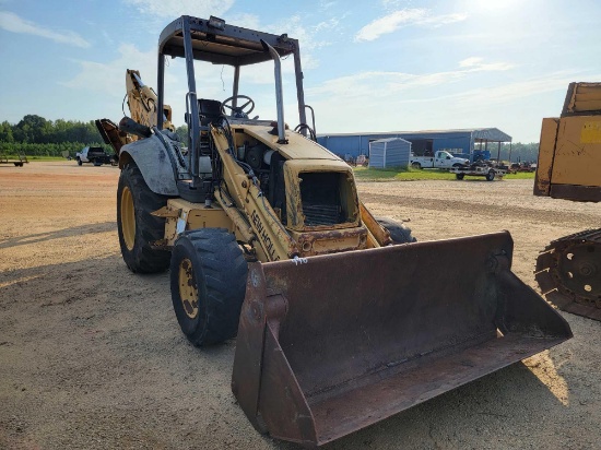 448 - ABSOLUTE FORD NEW HOLLAND 555E BACKHOE