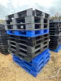 2403 - 12 - PLASTIC PALLETS